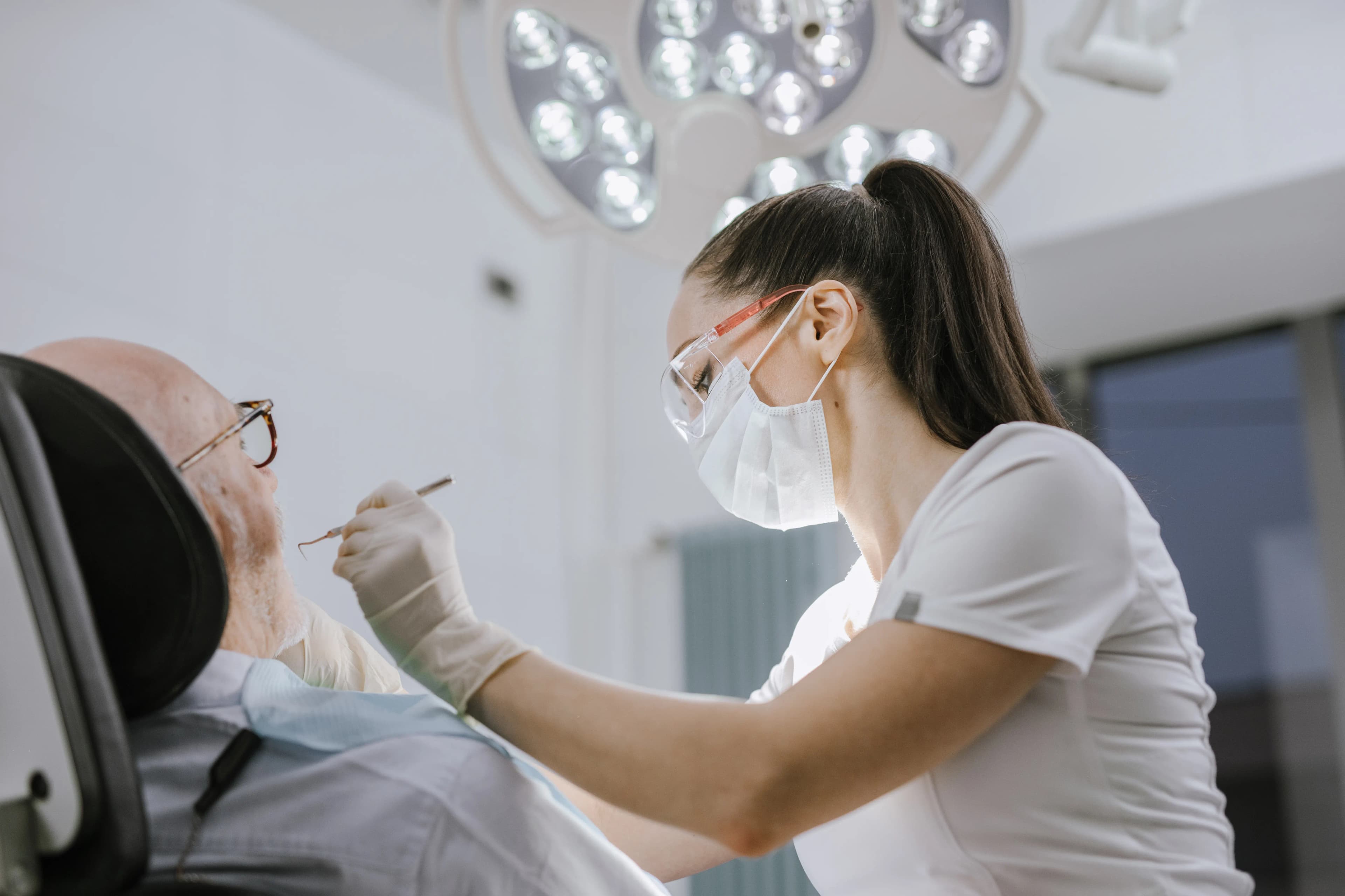 Dentist performing a routine checkup